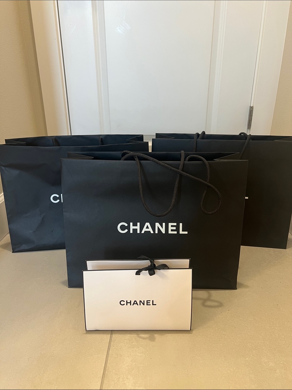 4 Chanel shopping bags